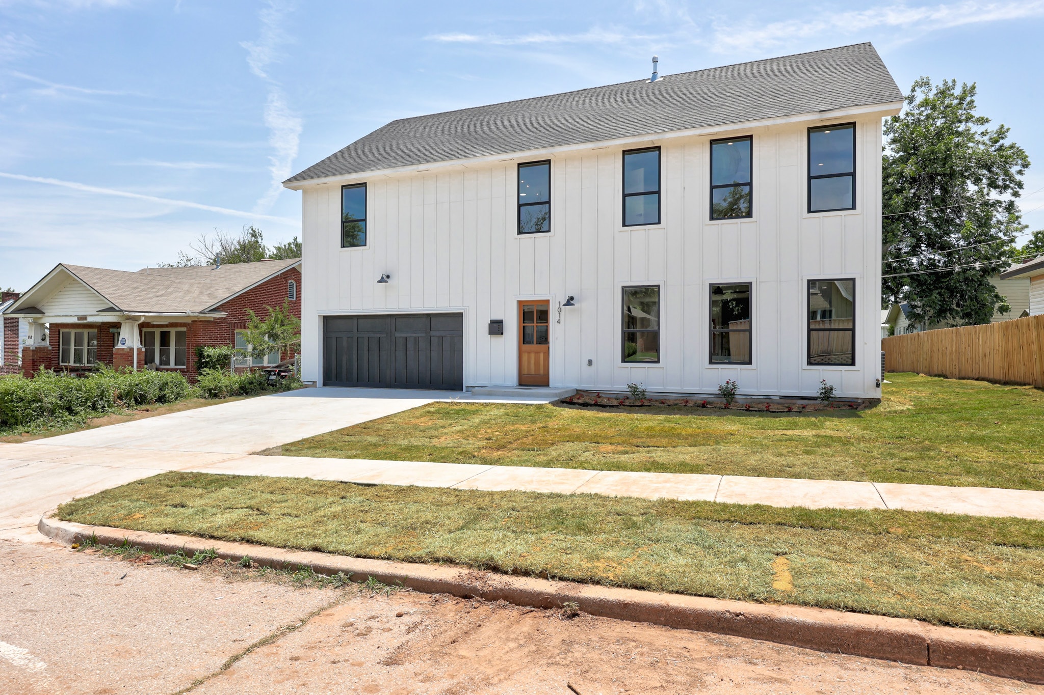 1014 NW 33rd St — white board and batten modern farmhouse exterior