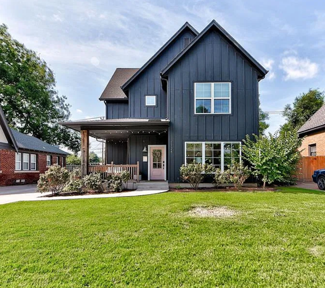 1124 NW 43rd St — navy board and batten modern farmhouse exterior