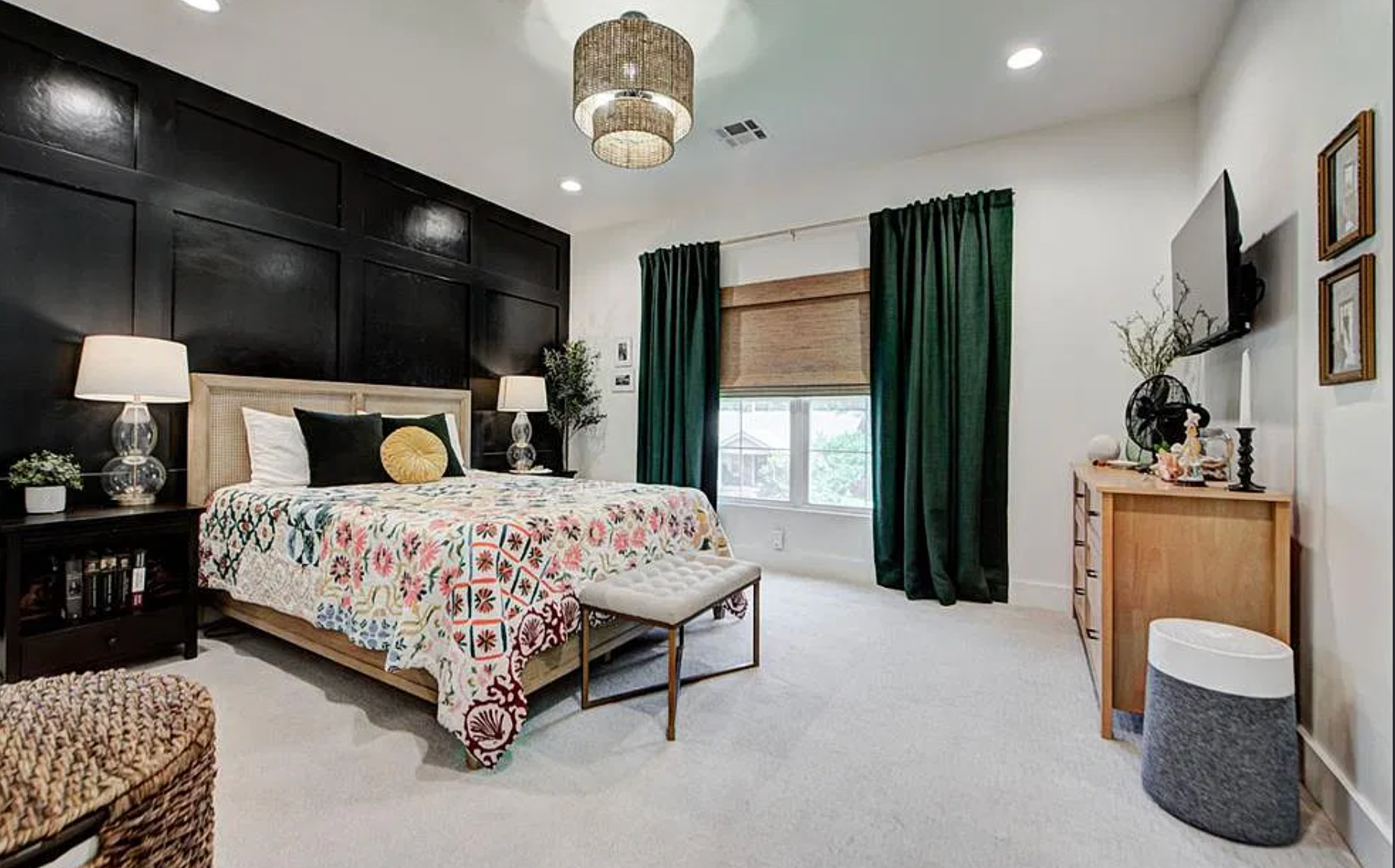 1124 NW 43rd St — primary bedroom with black board and batten accent wall