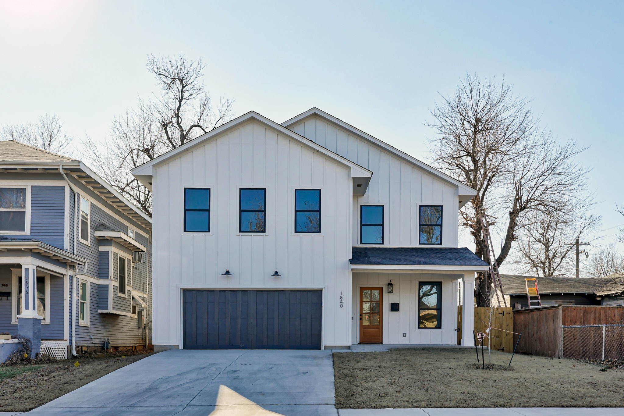 1840 NW 14th St — white modern farmhouse exterior