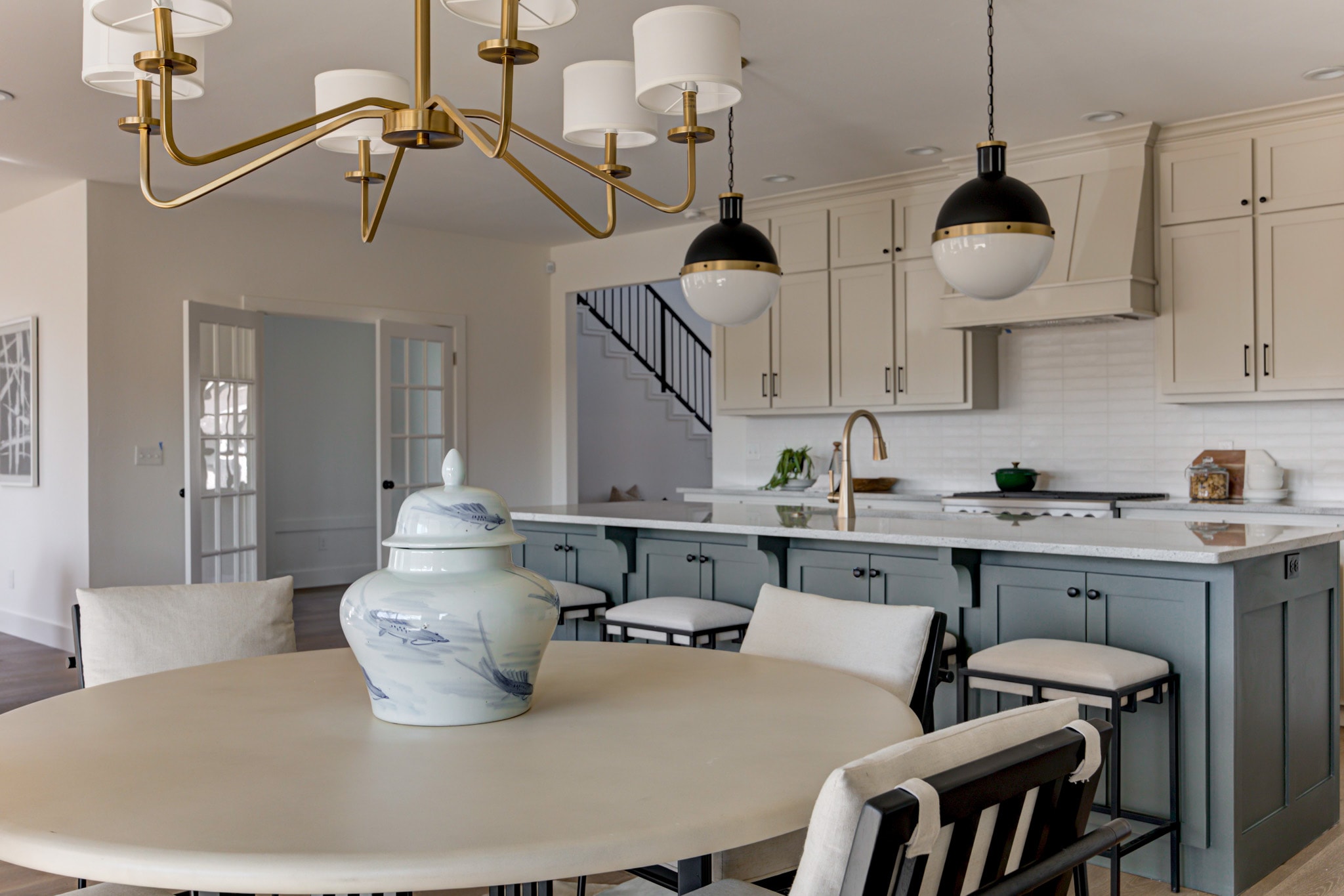 1840 NW 14th St — kitchen with sage island and brass pendants