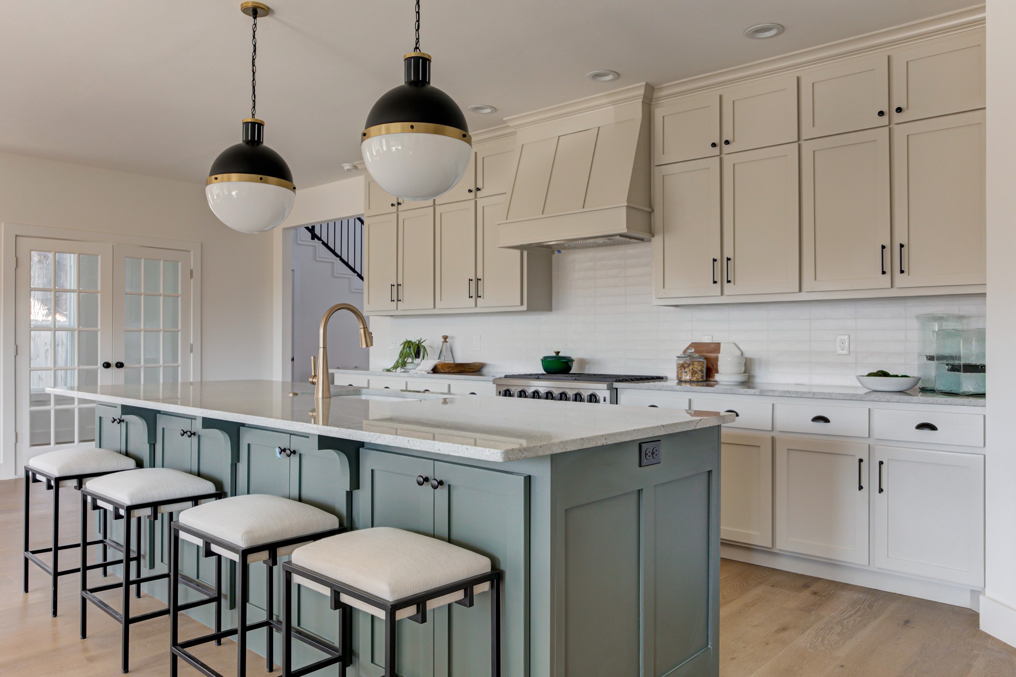 1840 NW 14th St — kitchen dining area with brass chandelier